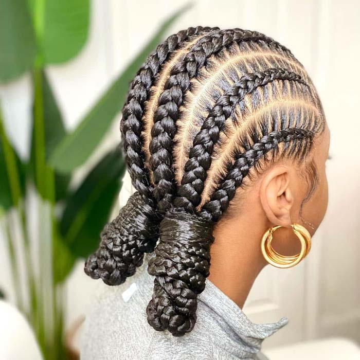 Cornrows Pulled Into Two Mid-Back Ponytail Braids Cornrows Pulled Into Two Mid-Back Ponytail Braids — Parts Braids