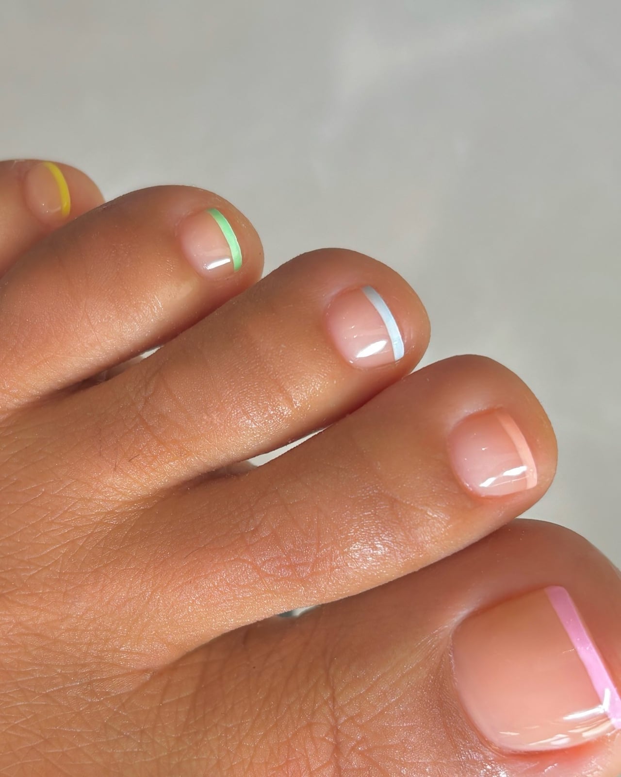 Nude Base Pastel Fine Line Accent Pedicure Nude Base Pastel Fine Line Accent Pedicure — Pedicure Nails