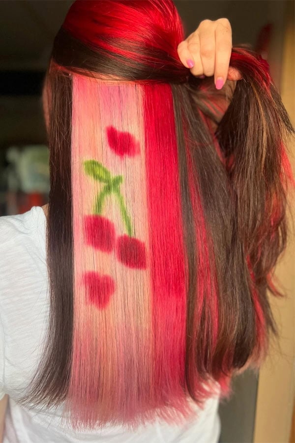 Dark Brown With Red Pink Peekaboo and Cherry Graphic — Peekaboo Hair Color