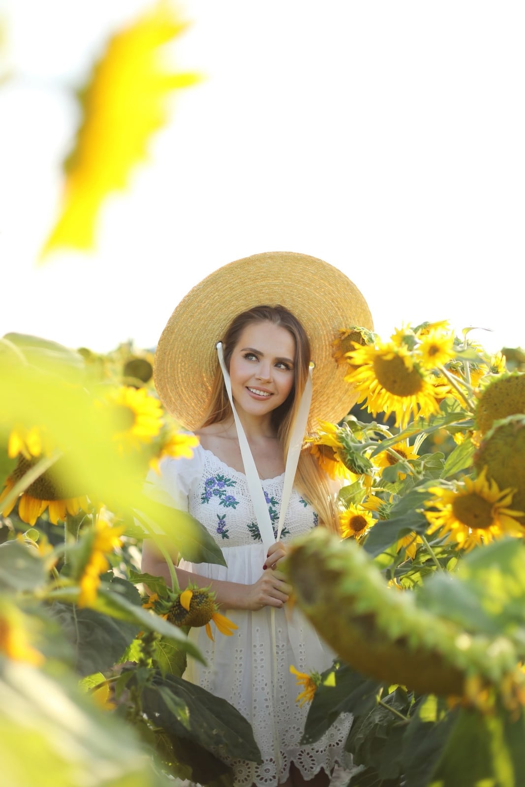 White Embroidered Dress and Straw Hat White Embroidered Dress and Straw Hat — Photoshoot Outfits