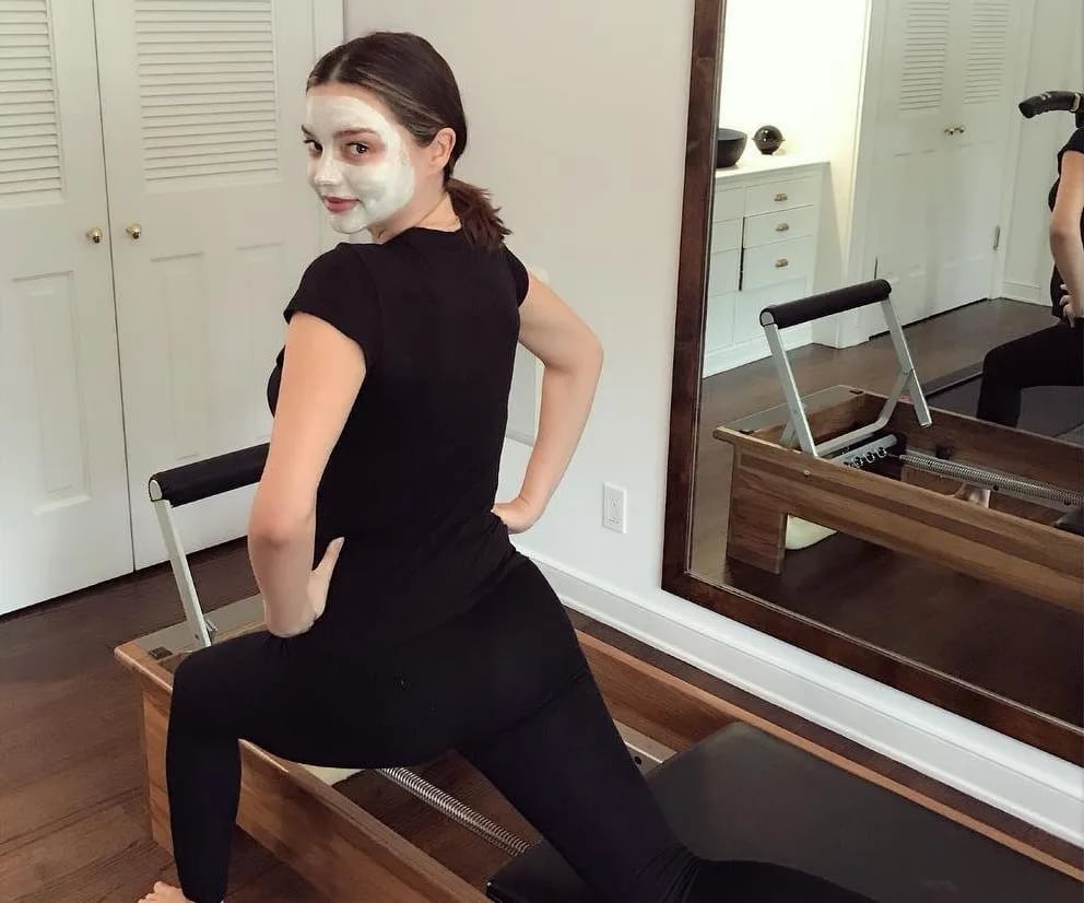 Black Bodysuit With Cream Knit Sweater Layer — Pilates Outfits