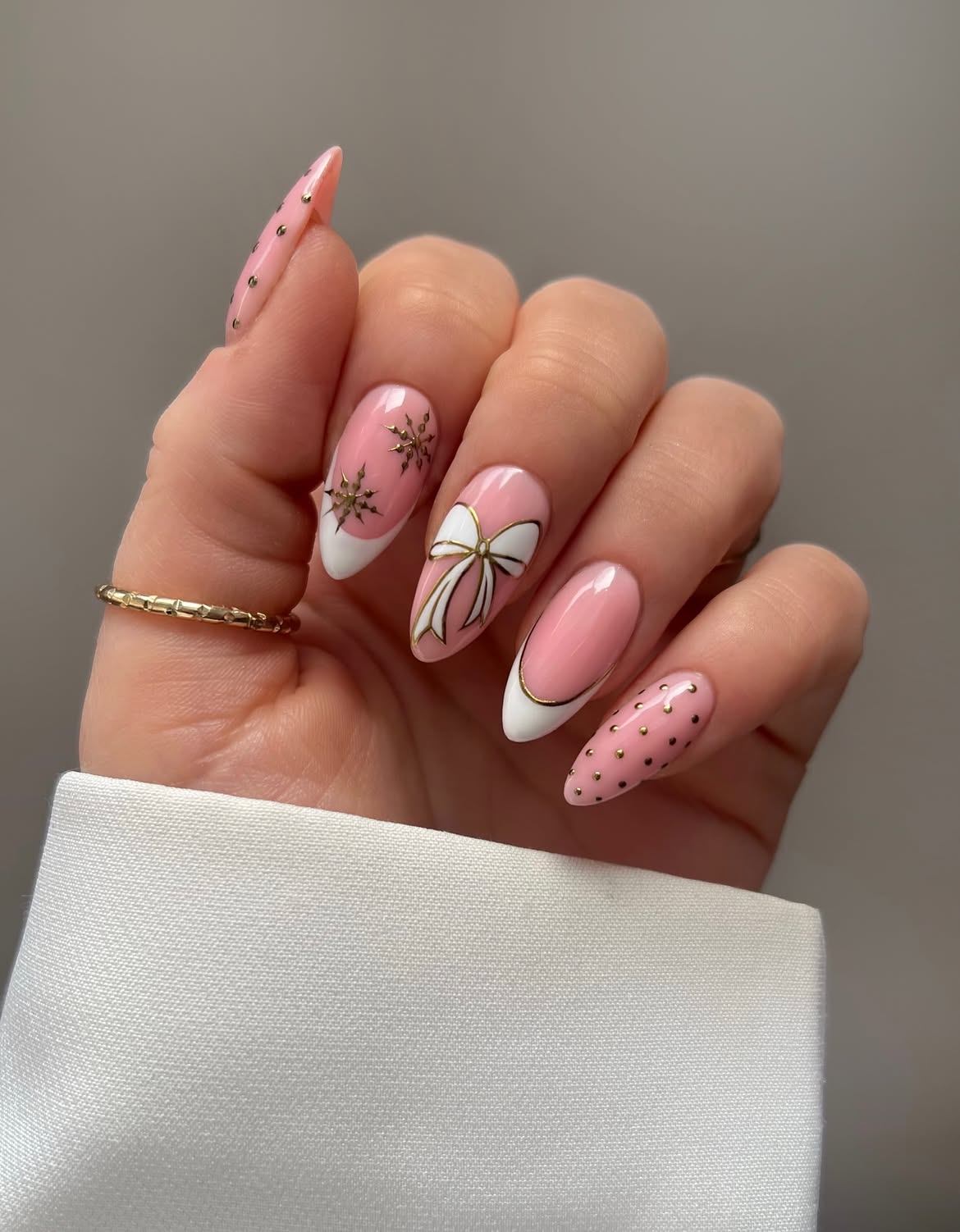 Pink French Tip Bow and Snowflake Nails