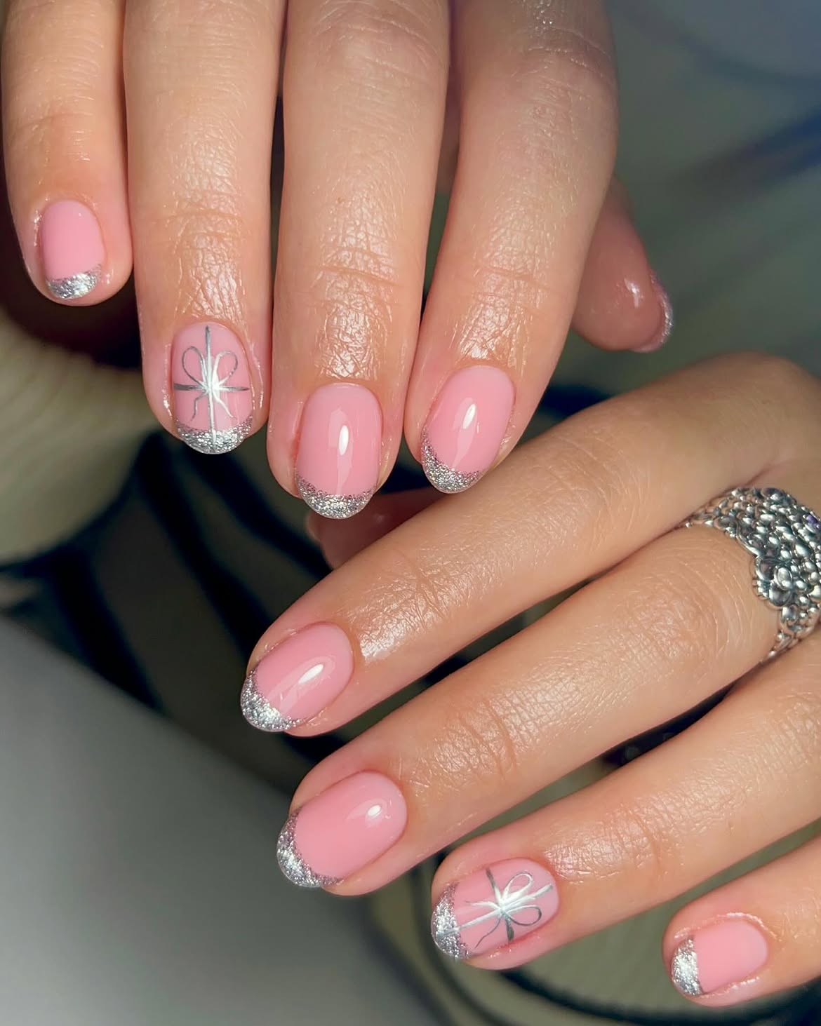 Pink French Tip Nails with Silver Bow Detail