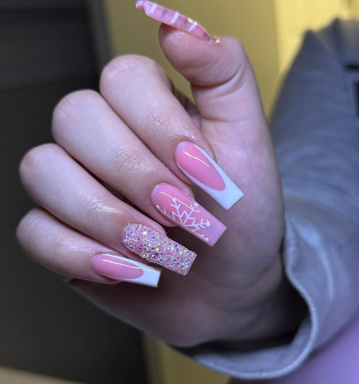 Pink French Tips With Snowflake And Glitter Accent Coffin Nails