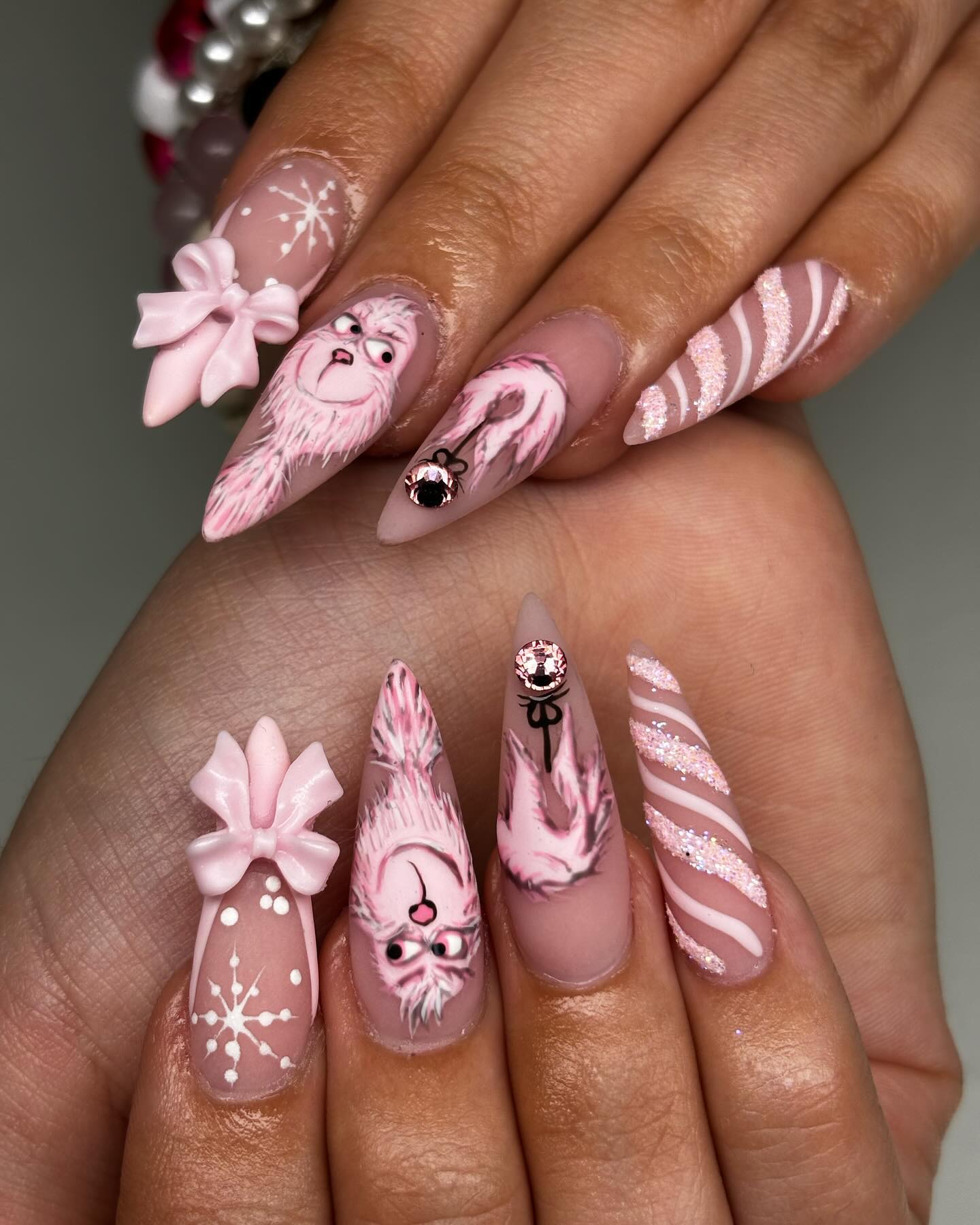 Pink Grinch Candy Cane Stiletto Nails