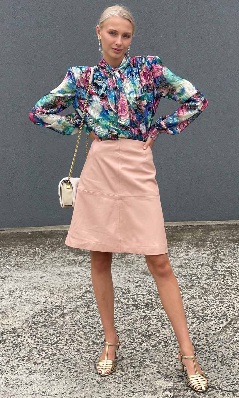 Pale Pink Suede-Like A-Line Skirt with Floral Print, Close-Up Take — Pink Skirt Outfit