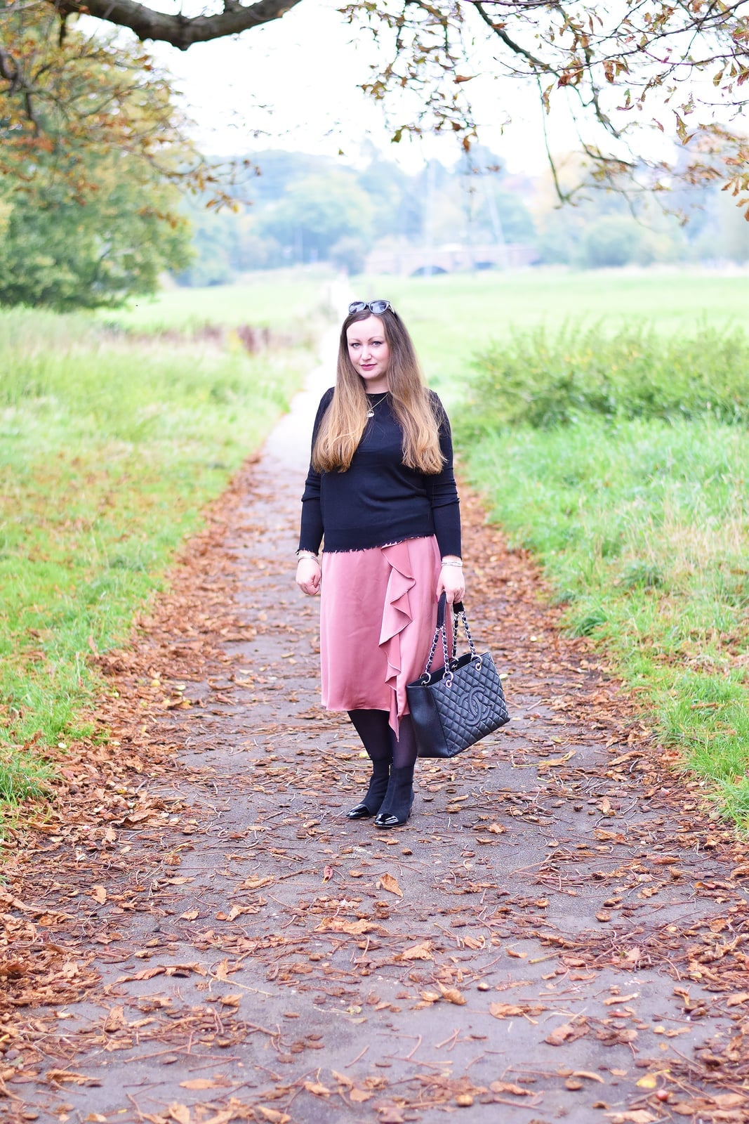 Ruffled Pink Satin Midi Skirt with Black Long-Sleeve Top — Pink Skirt Outfit