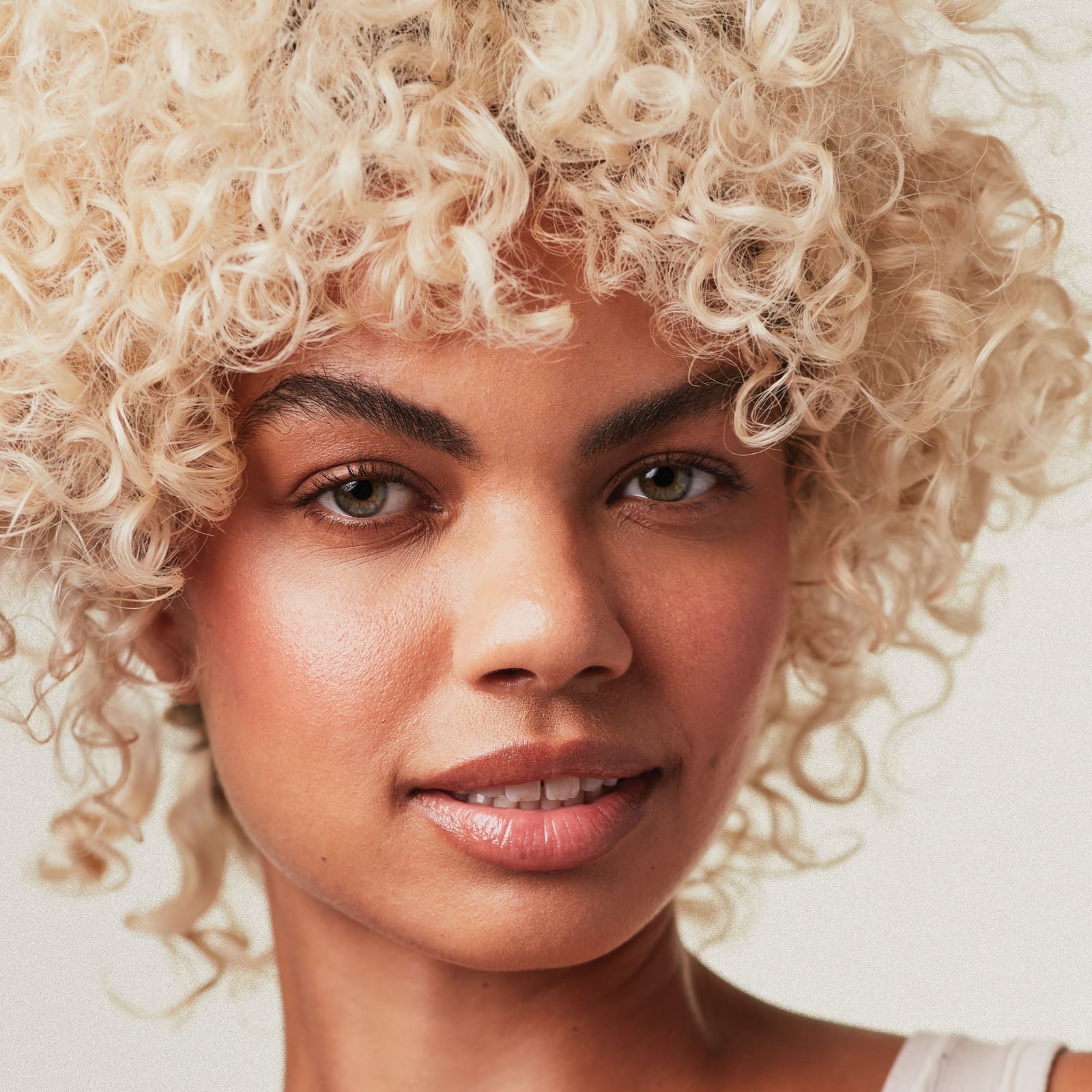 Thick Curly Platinum Blonde With Natural Texture Thick Curly Platinum Blonde With Natural Texture