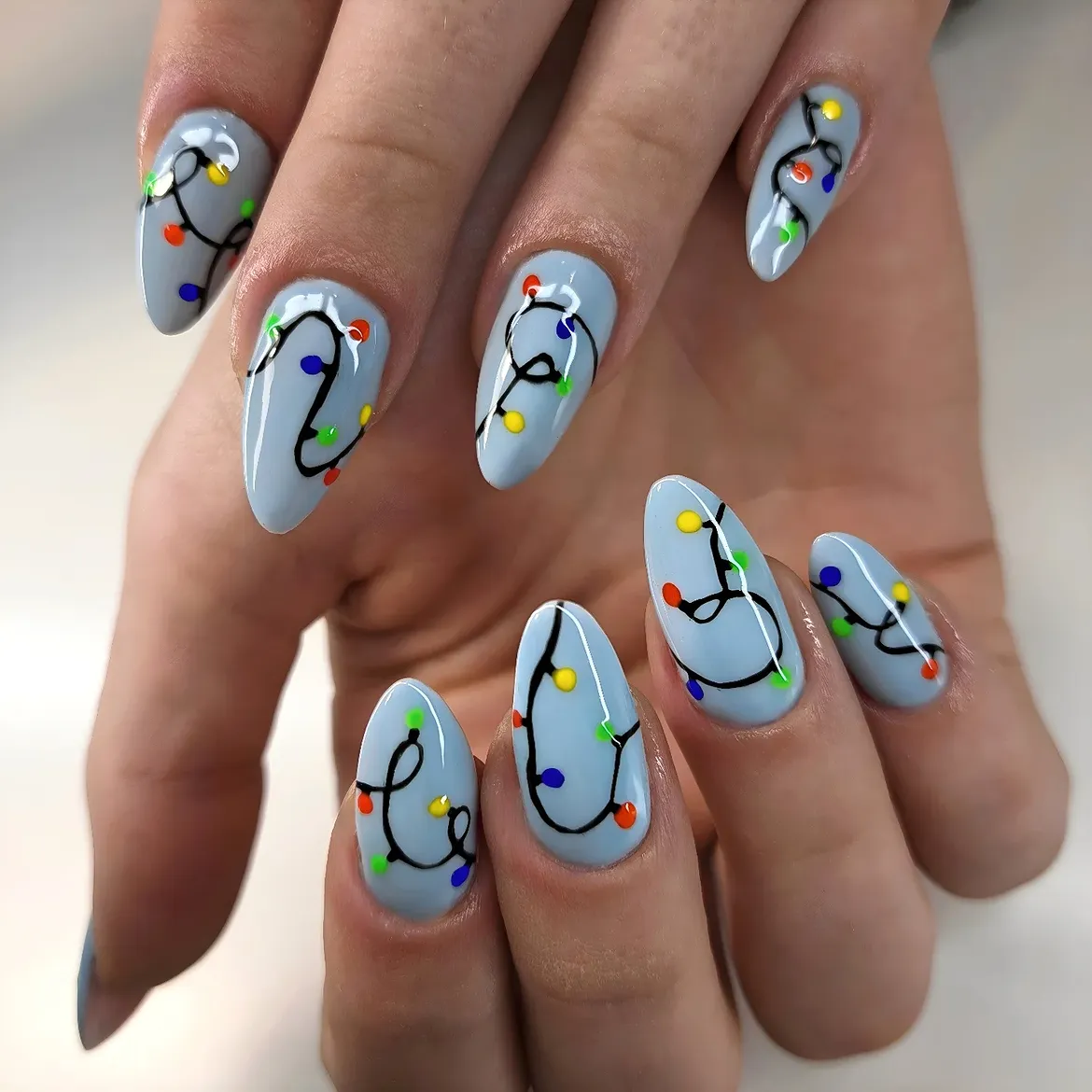 Playful Christmas Lights Almond Nails