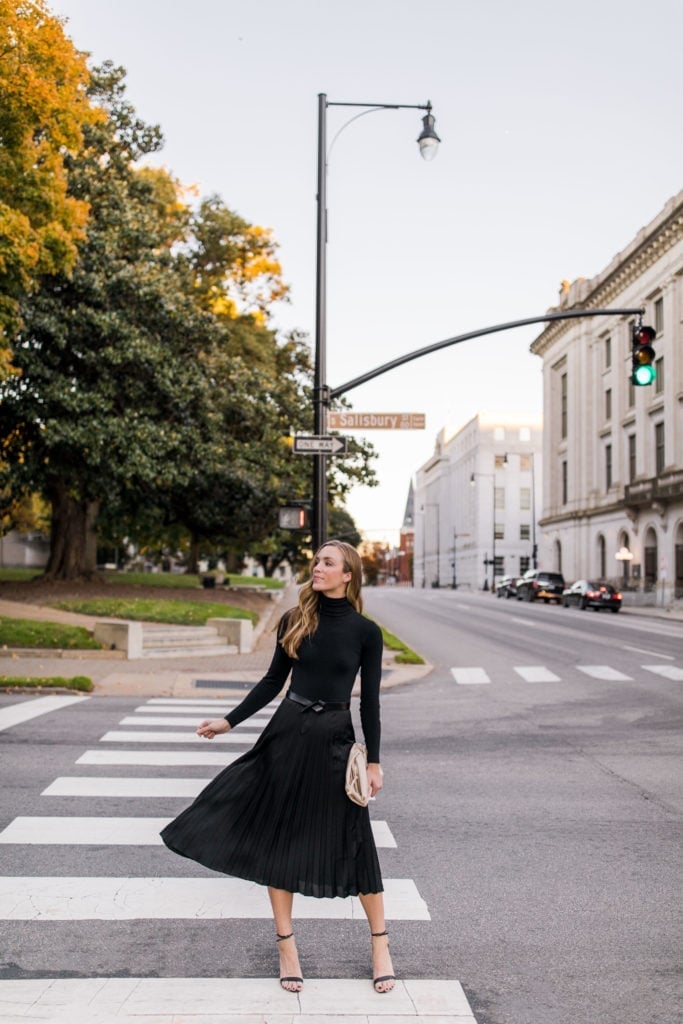 Black Pleated Midi Skirt with Black Turtleneck, Close-Up Take — Pleated Skirt Outfits