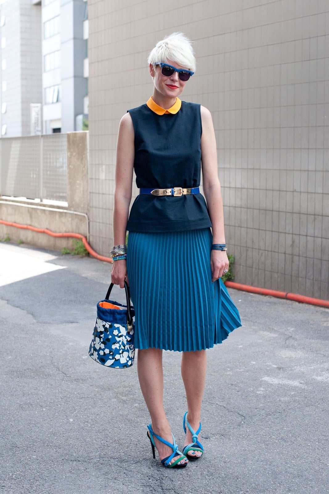 Bright Blue Pleated Midi Skirt with Navy Sleeveless Top, Close-Up Take — Pleated Skirt Outfits