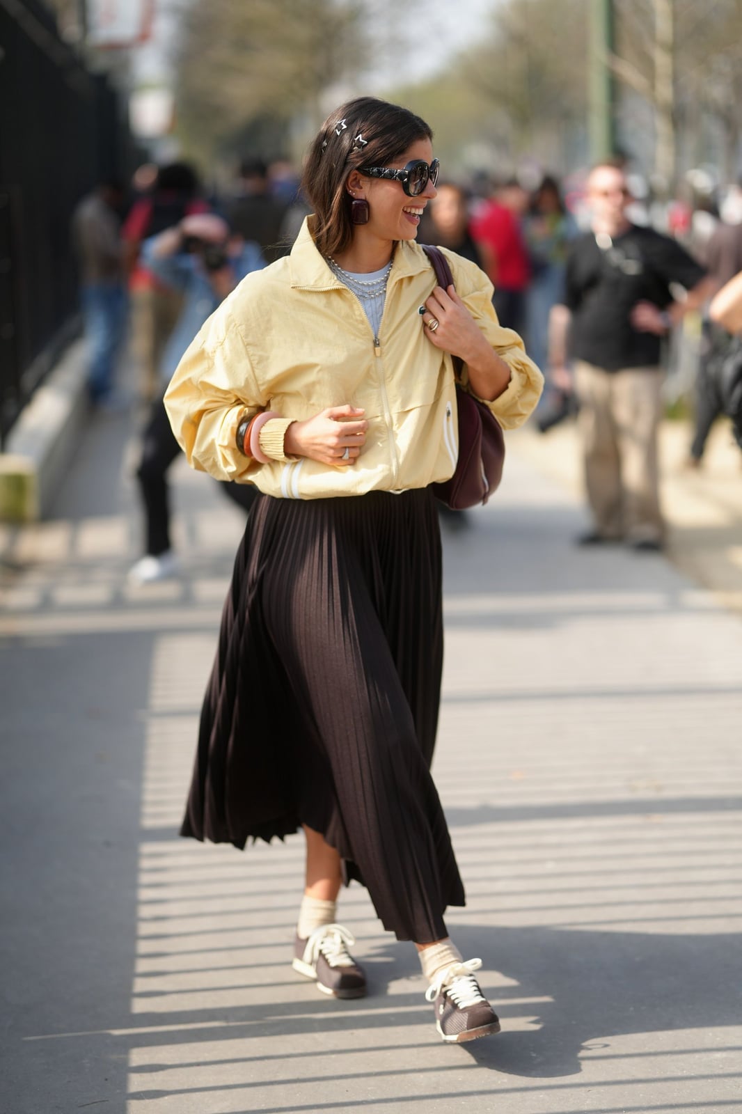 Black Pleated Midi Skirt with Yellow Track Jacket — Pleated Skirt Outfits