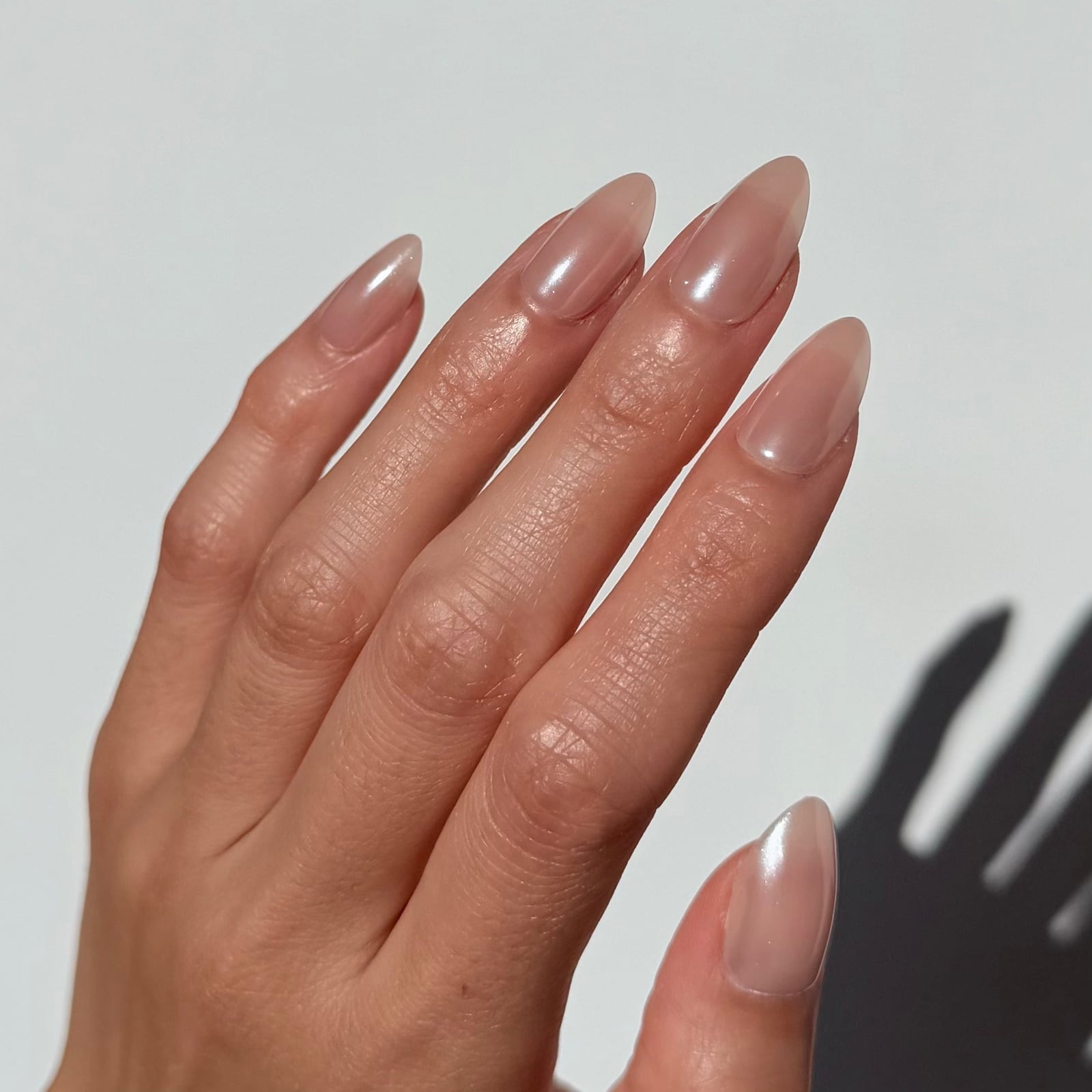 Pearlescent Sheer Nude Almond Nails Pearlescent Sheer Nude Almond Nails — Professional Nails