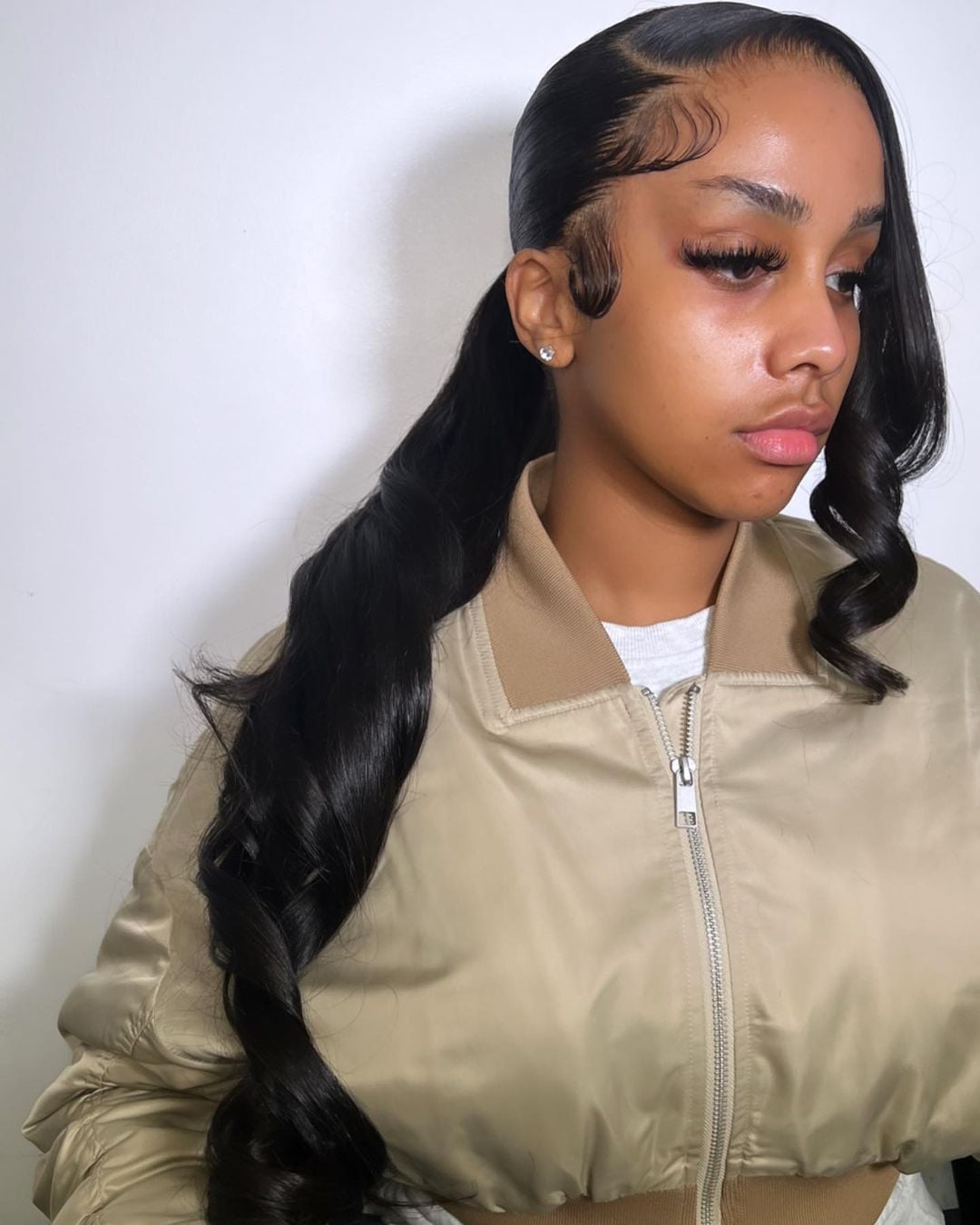 Side Parted Black Ponytail With Voluminous Waves — Quick Weave Ponytail