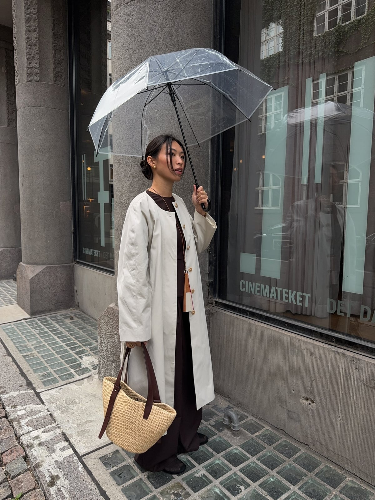 Light-colored Long Coat with Dark Jumpsuit for Urban Rain — Rain Jacket Outfits