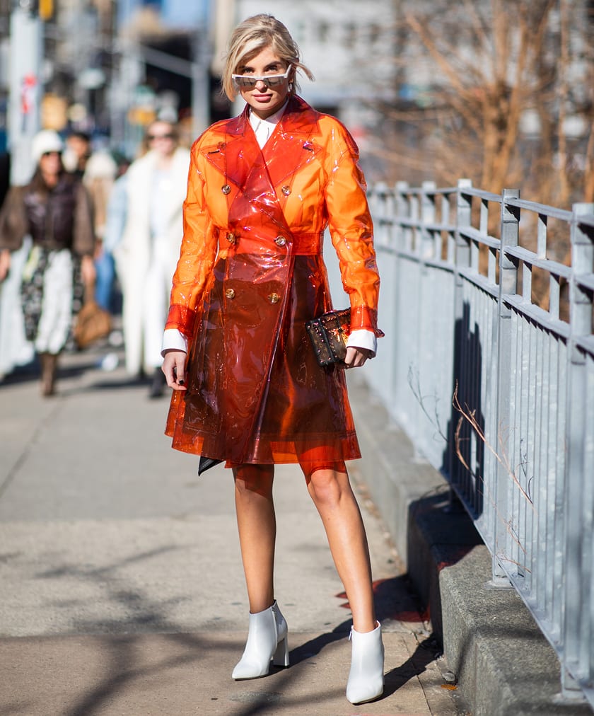 Orange Transparent Vinyl Jacket Over a White Shirt for a Fashion — Rain Jacket Outfits