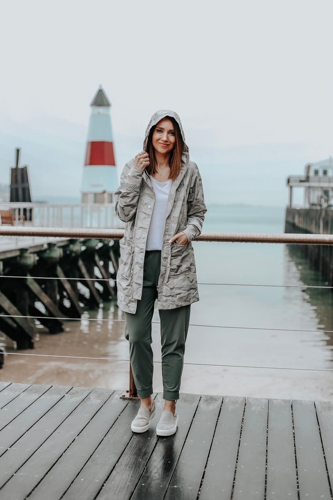 Gray Patterned Hooded Jacket Over White T-Shirt with Olive Trousers — Rain Jacket Outfits