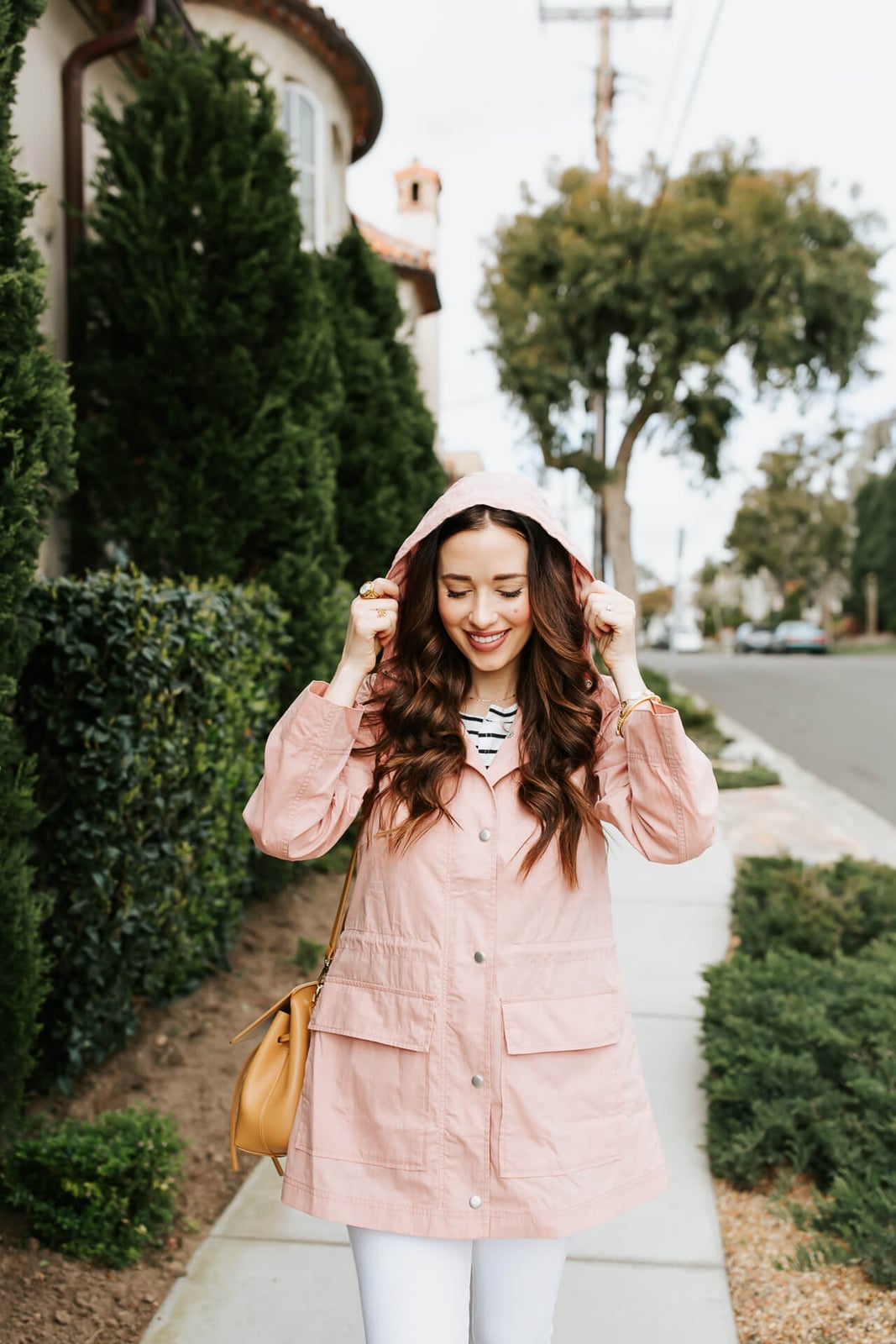 Pink Hooded Jacket Over Striped T-Shirt with Crossbody Bag — Rain Jacket Outfits