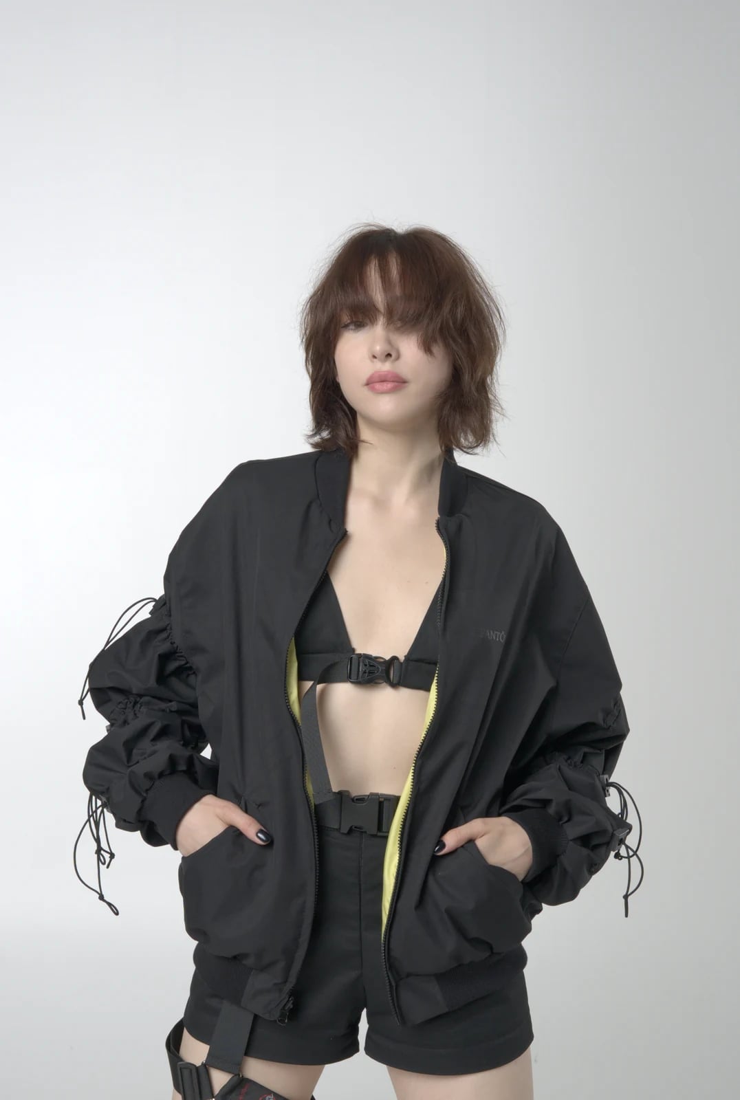 Oversized Bomber Jacket Over Bralette and Utility Shorts — Rave Outfits
