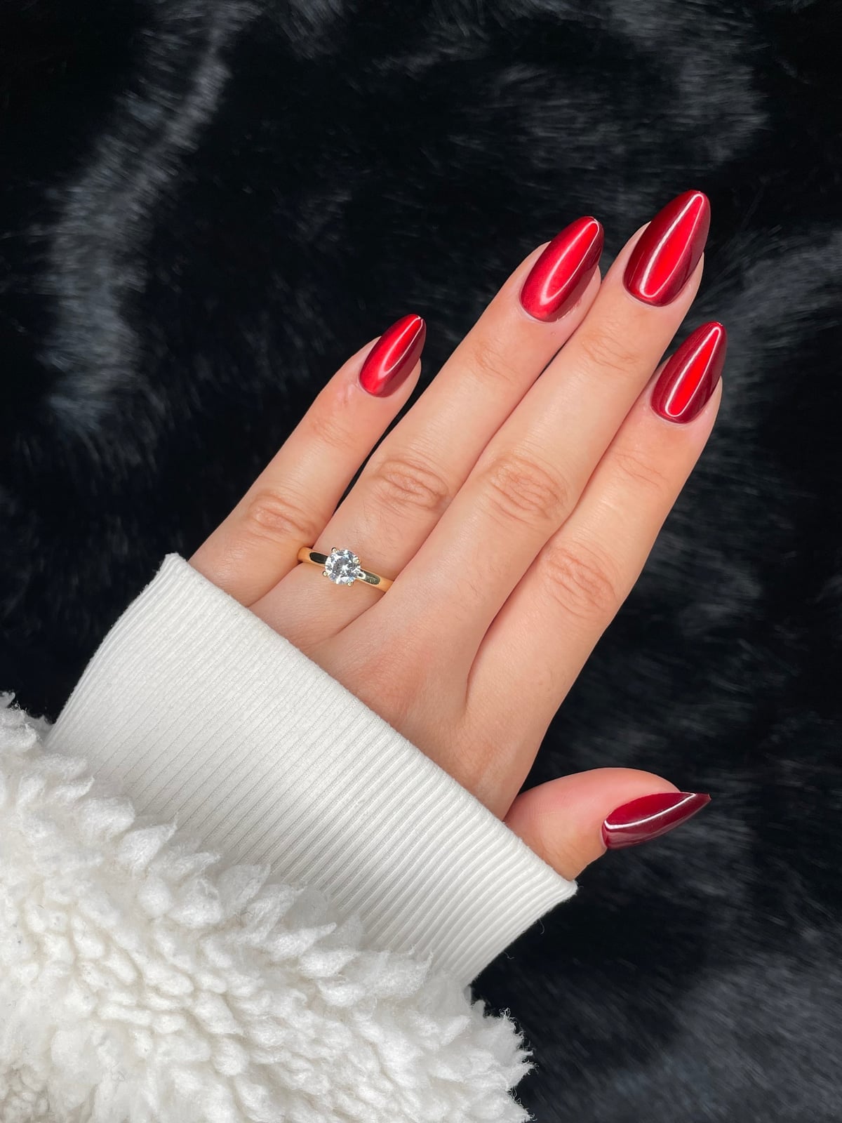 Deep Red Glossy Cat-Eye Long Almond Fingernails, Close-Up Take Deep Red Glossy Cat-Eye Long Almond Fingernails, Close-Up Take — Red Almond Nails