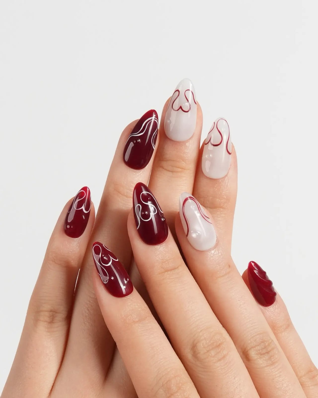 Medium Almond Abstract Red Line Art Nails Medium Almond Abstract Red Line Art Nails — Red and White Nails