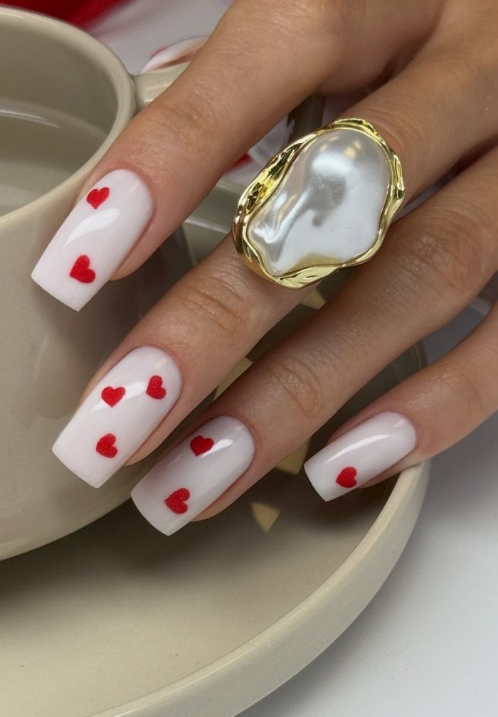 Milky White Nails With Small Red Hearts Milky White Nails With Small Red Hearts — Red and White Nails