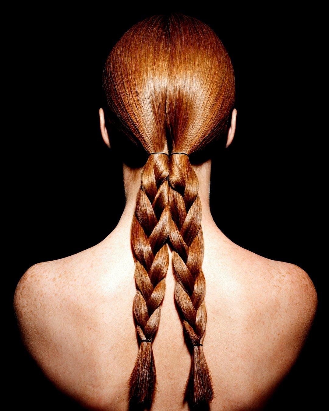 Mid-Back Two Neat Red Braids