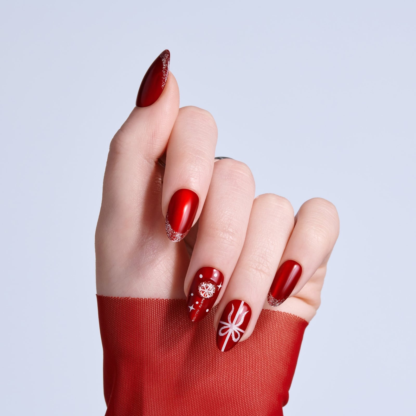 Long Stiletto Red Nails with Snowflake Bows Long Stiletto Red Nails with Snowflake Bows — Red Christmas Nails Designs