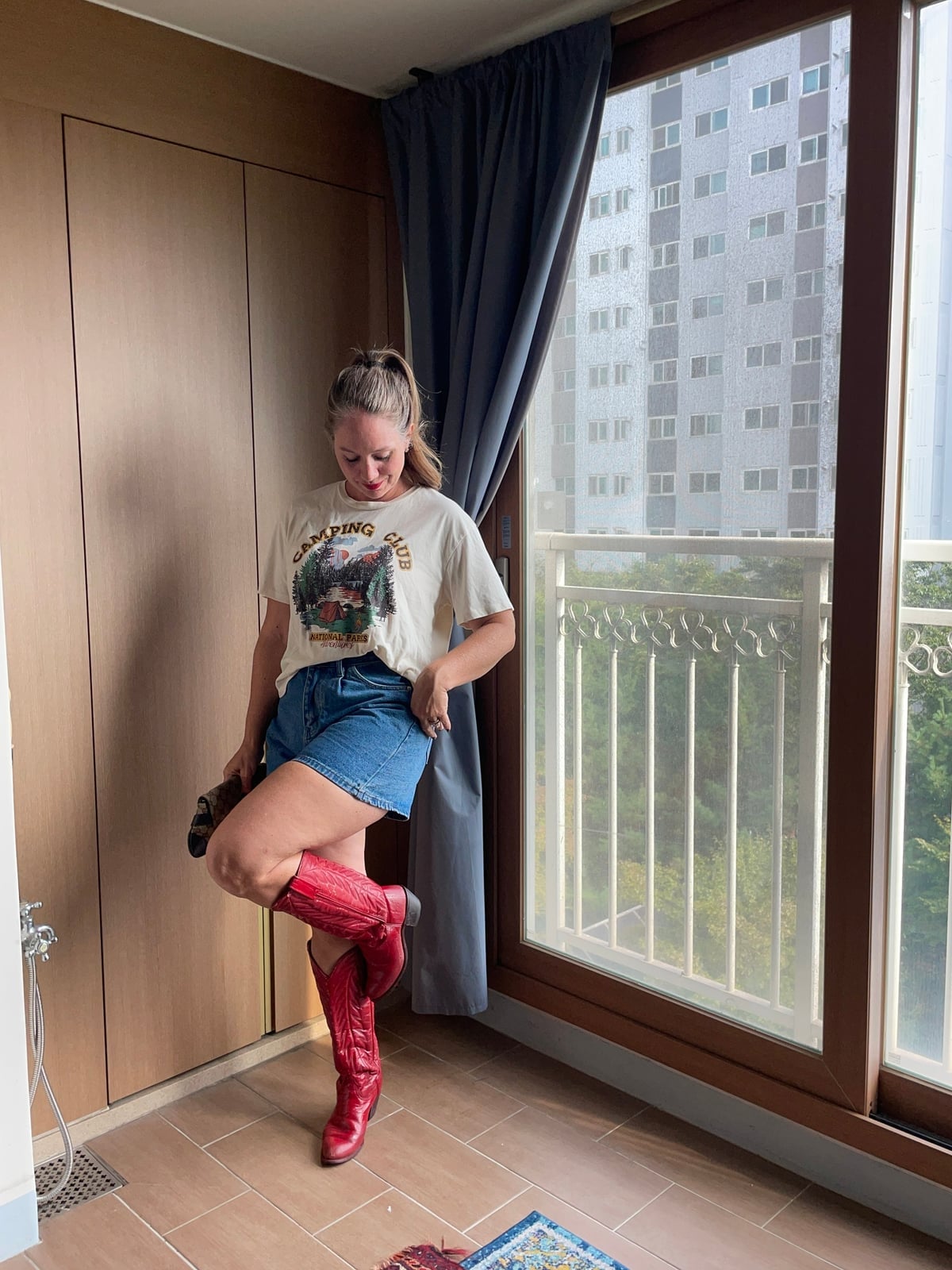 Red Cowboy Boots With Graphic Tee and Denim Shorts — Red Cowboy Boots Outfit