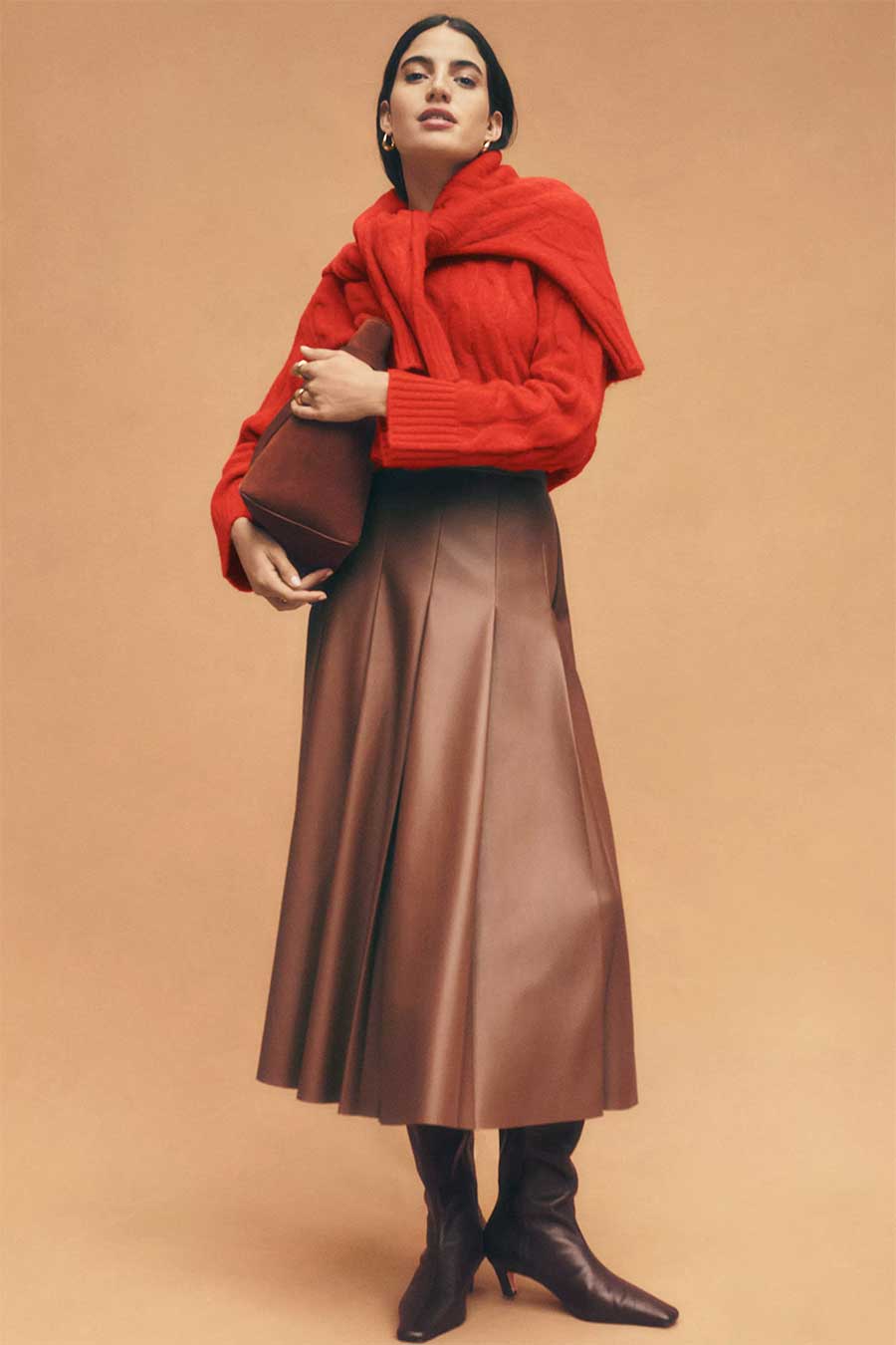Red Cable Knit Sweater With Faux Leather Midi Skirt, Close-Up Take Red Cable Knit Sweater With Faux Leather Midi Skirt, Close-Up Take — Red Sweater Outfit