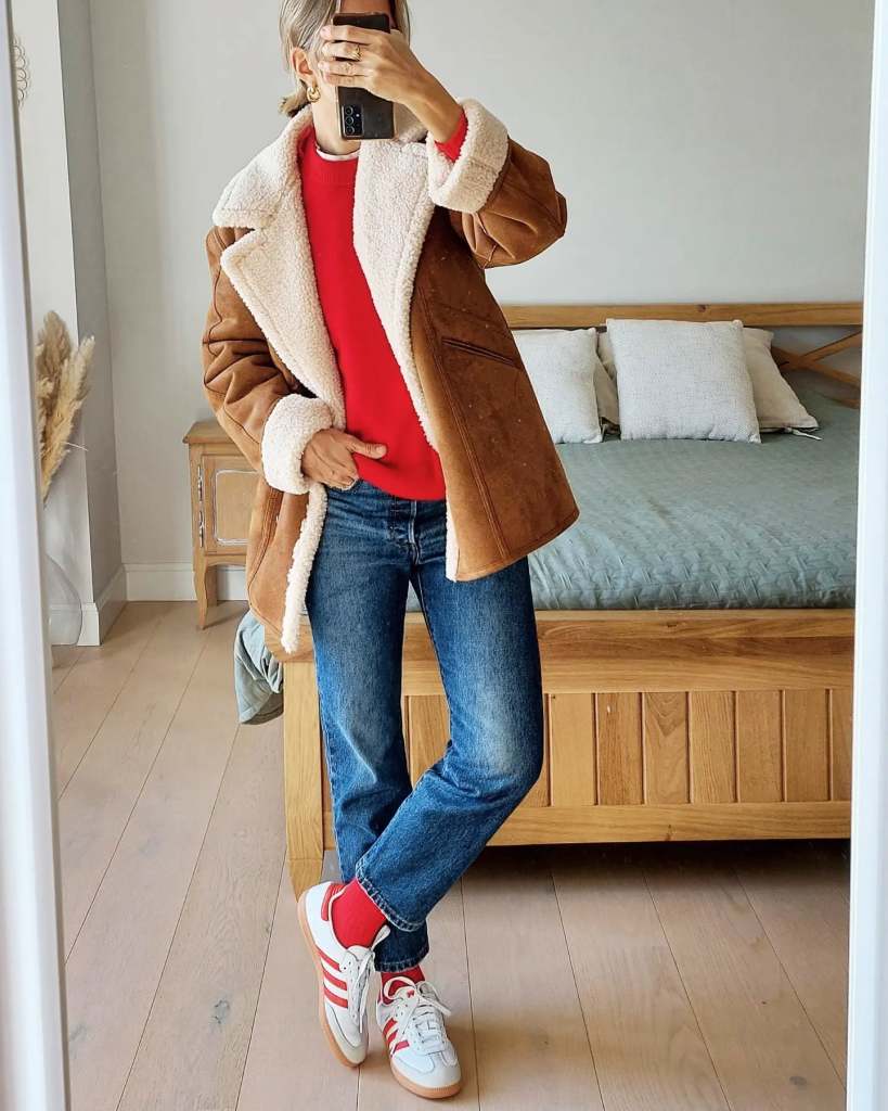 Red Crewneck Sweater Under Shearling Jacket, Close-Up Take Red Crewneck Sweater Under Shearling Jacket, Close-Up Take — Red Sweater Outfit