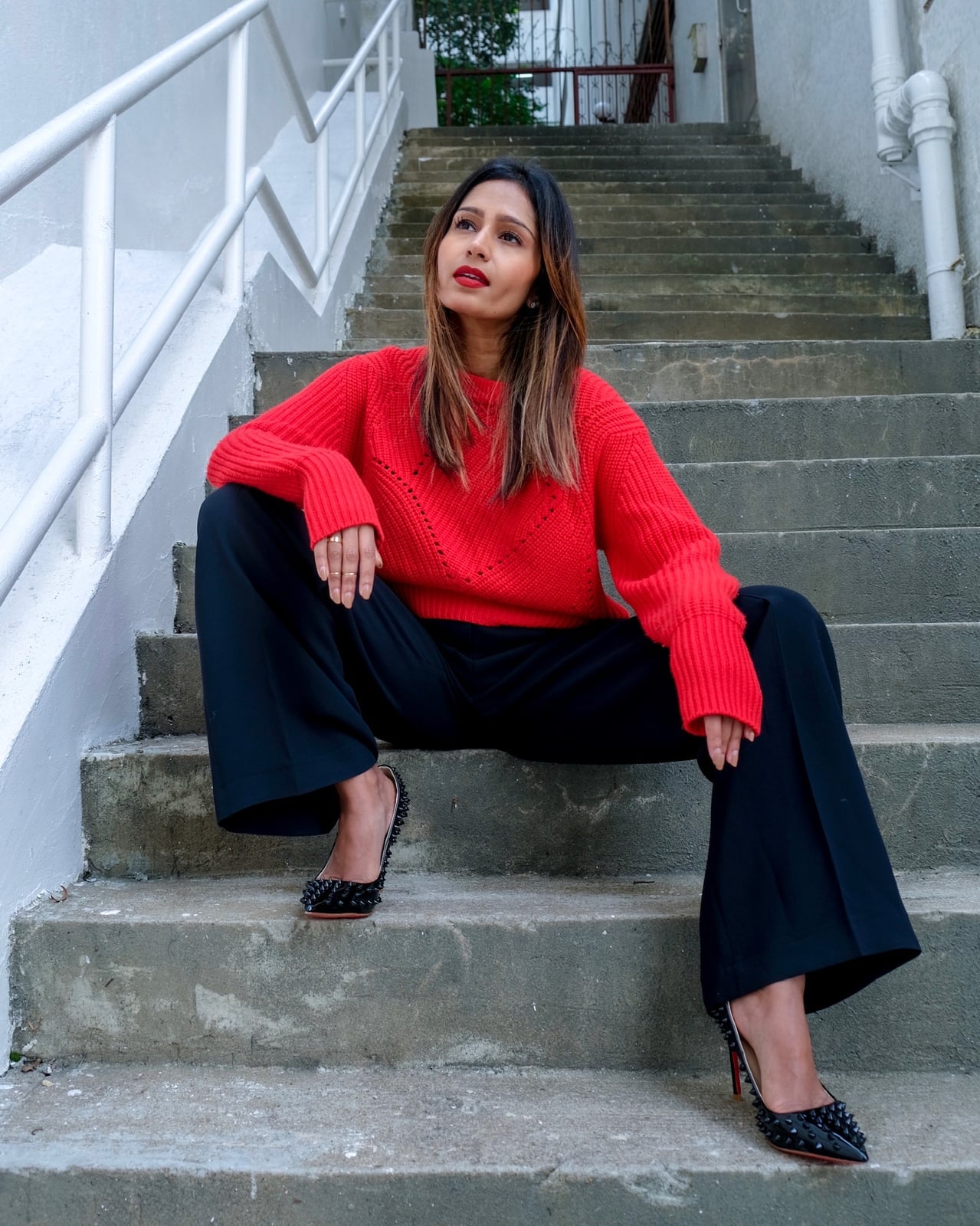 Textured Red Knit Sweater With Black Wide Leg Pants, Close-Up Take Textured Red Knit Sweater With Black Wide Leg Pants, Close-Up Take — Red Sweater Outfit