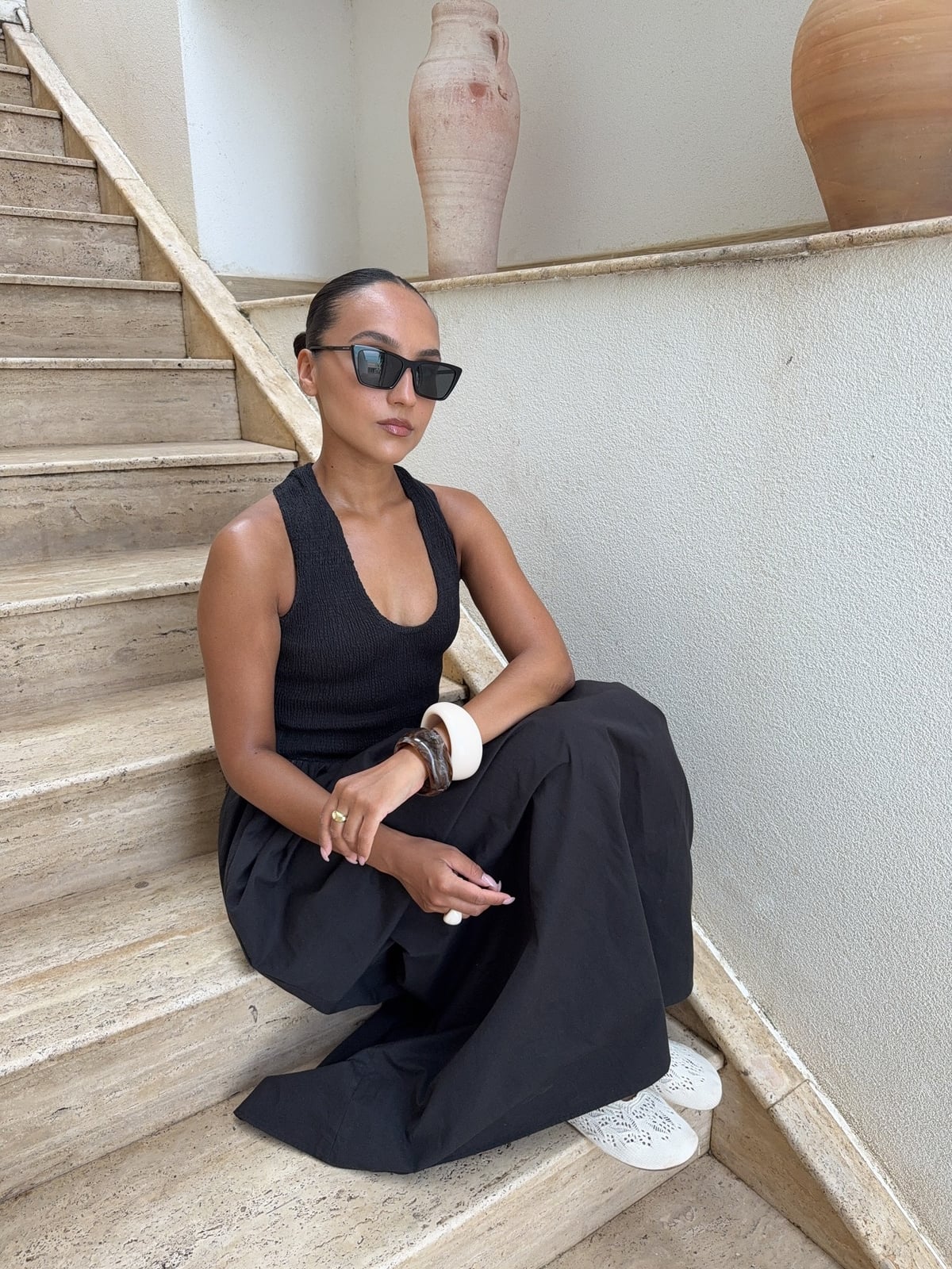 Black Knit Halter Top and Wide Leg Trousers for a Casual Dinner — Restaurant Outfit
