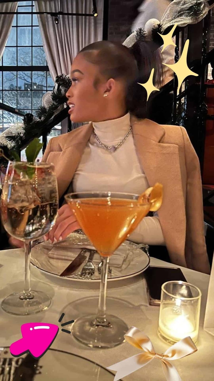 A Camel Coat Draped Over a White Turtleneck Offers Refined Dining — Restaurant Outfit