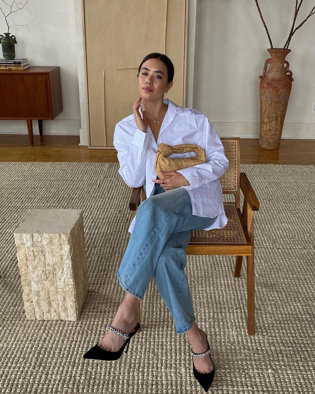 An Oversized White Shirt with Blue Jeans Offers a Casual Dinner Vibe — Restaurant Outfit