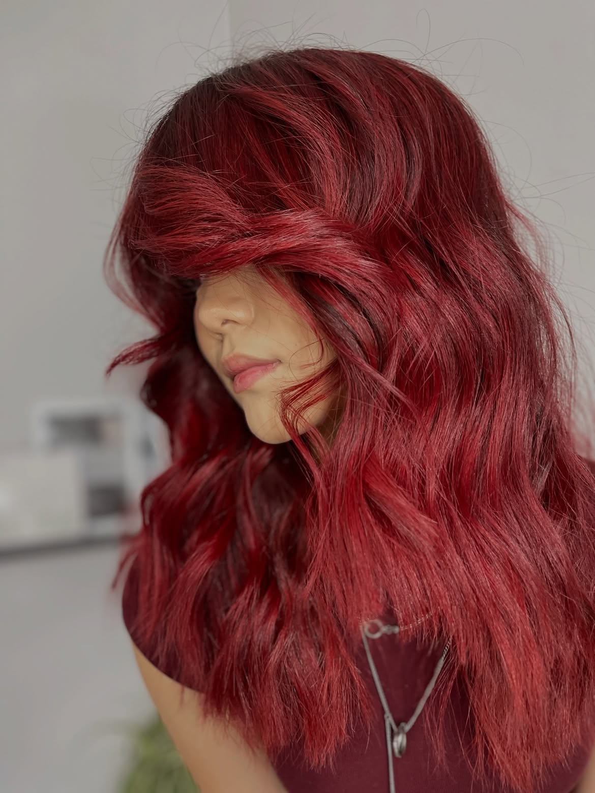 Rich Cherry Red Waves With Deep Side Part