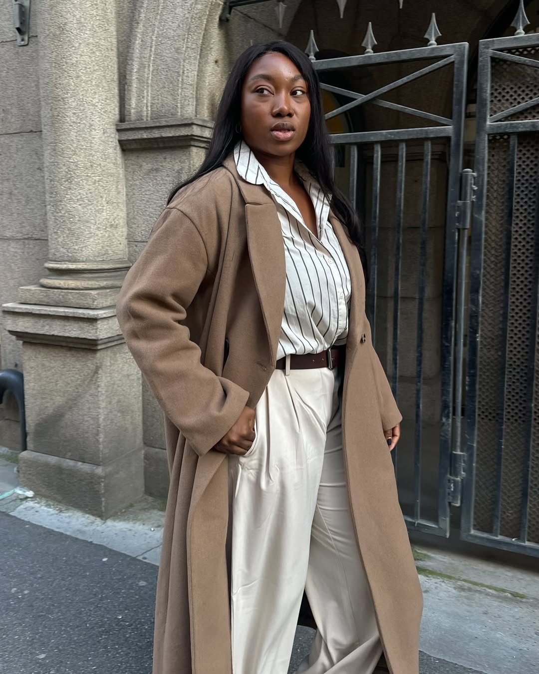 Camel Coat With Striped Shirt And Cream Trousers — Scandinavian Style