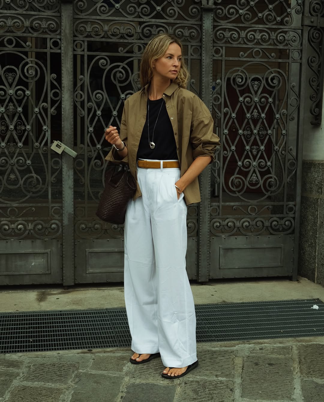 Khaki Shirt Over Black Top With White Trousers — Scandinavian Style