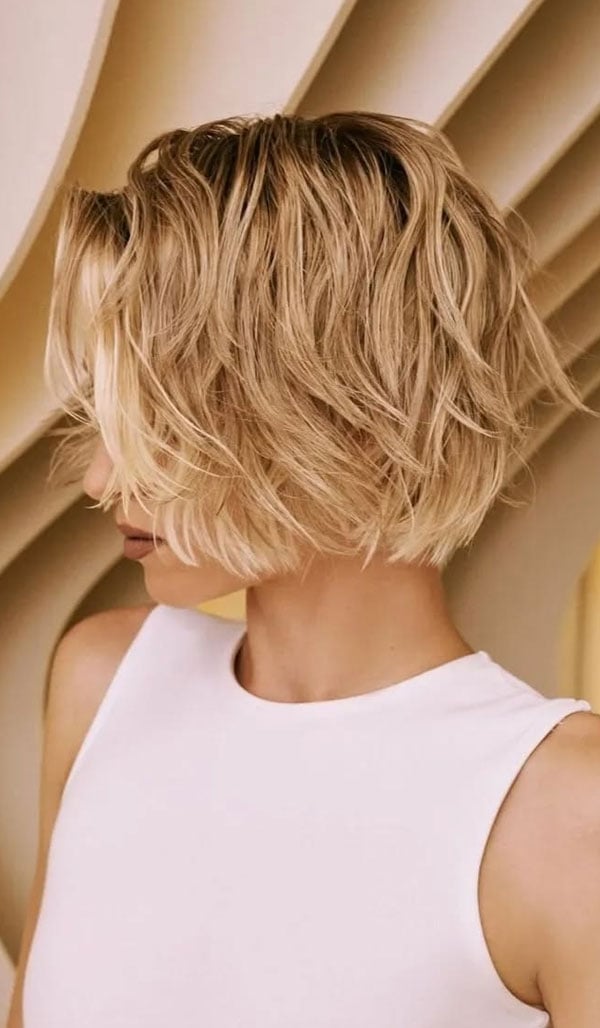 Collarbone Ash Blonde Shaggy Bob With Curtain Bangs, Wavy