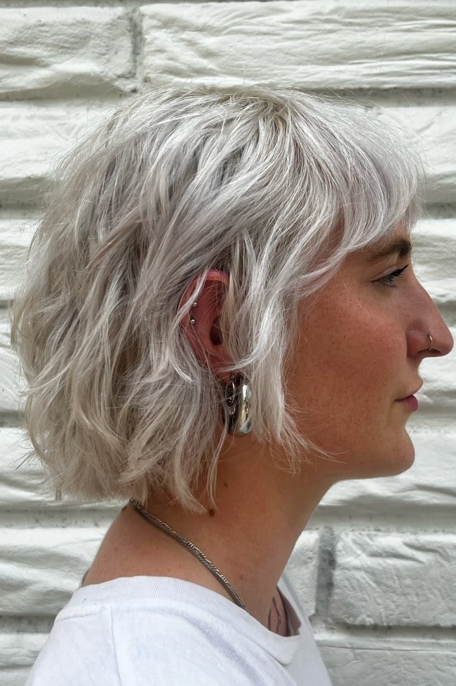 Chin Length Icy Platinum Shaggy Bob With Wispy Fringe