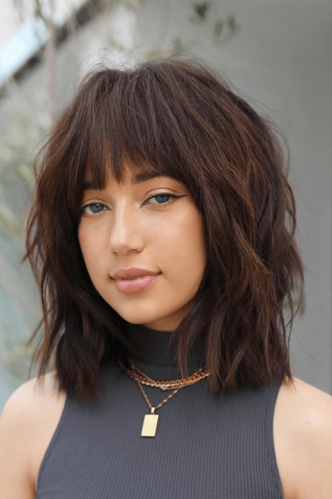 Collarbone Medium Brown Shaggy Bob With Highlights