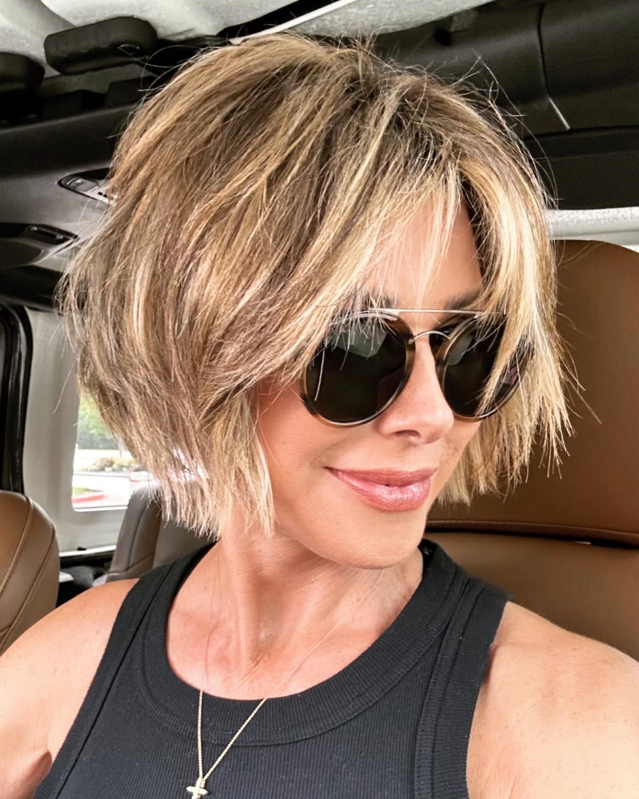 Chin Length Blonde Shaggy Bob With Choppy Layers