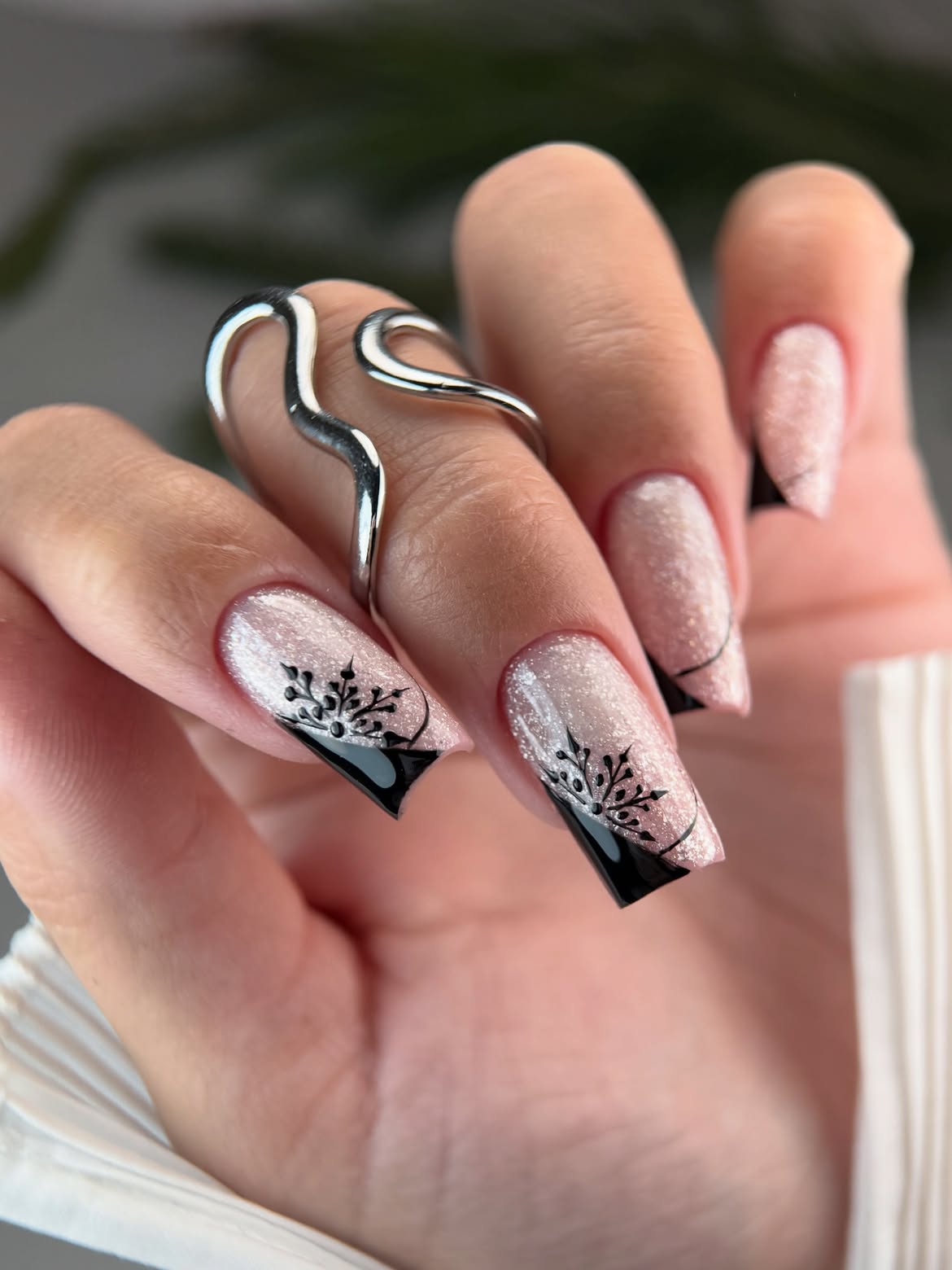 Shimmery Pink and Black French Snowflake Coffin Nails