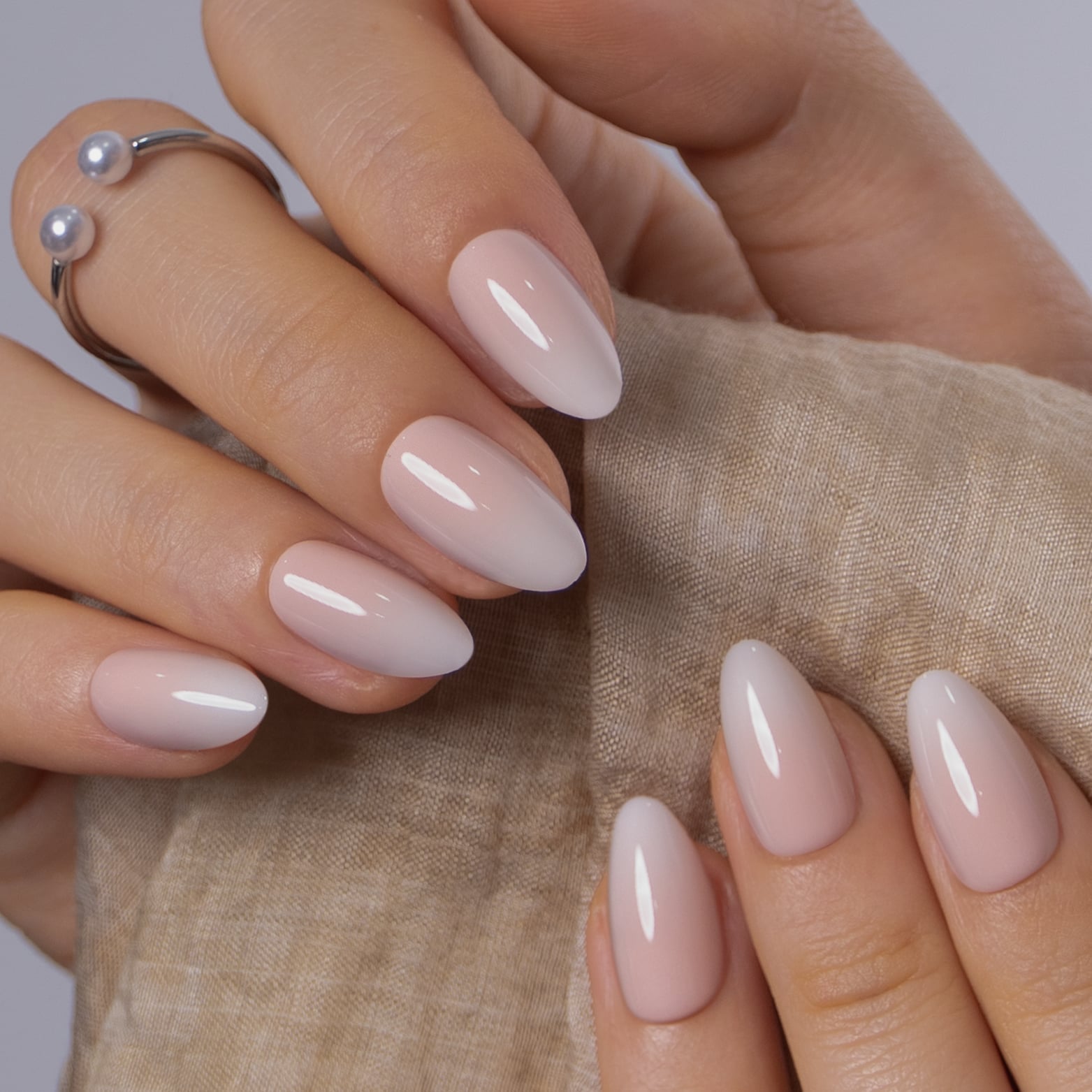 Soft Pink to White Glossy Ombre Short Almond Nails Soft Pink to White Glossy Ombre Short Almond Nails