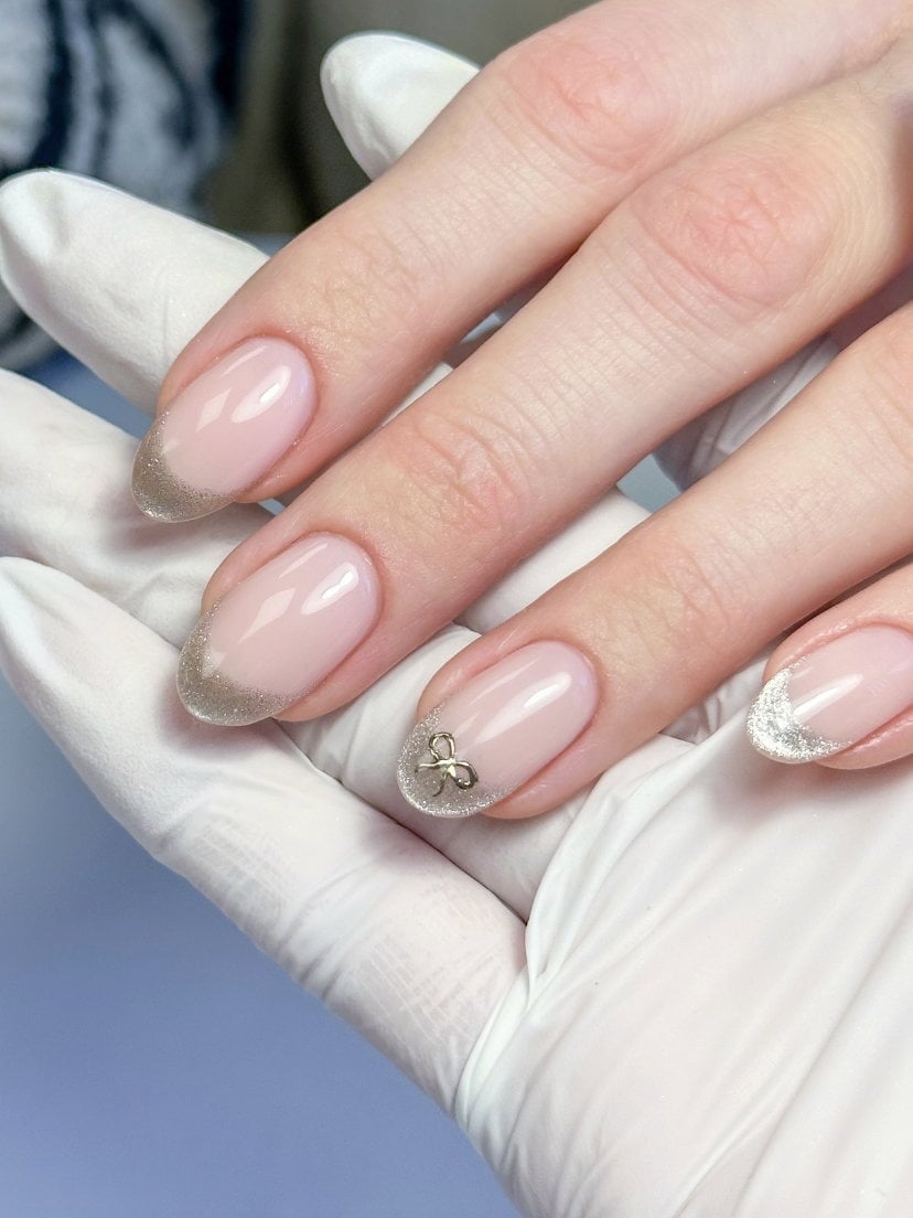 Sheer Pink Silver Glitter Bow Charm Short Oval Nails Sheer Pink Silver Glitter Bow Charm Short Oval Nails — Short French Tip Nails