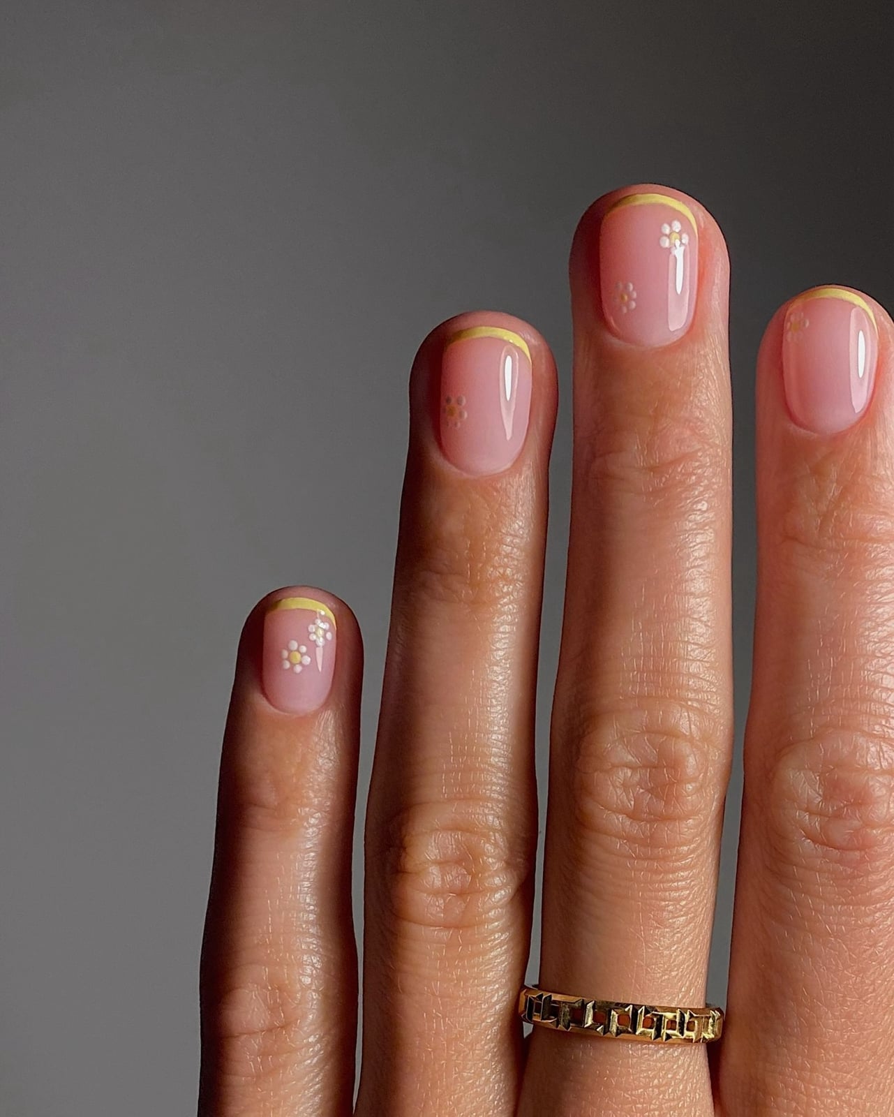 Sheer Pink with Gold Line and Floral Accents Sheer Pink with Gold Line and Floral Accents — Short Round Nails