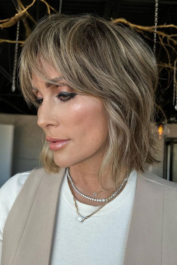 Collarbone Ash Blonde Shag With Side-Swept Bangs — Short Shag Haircuts