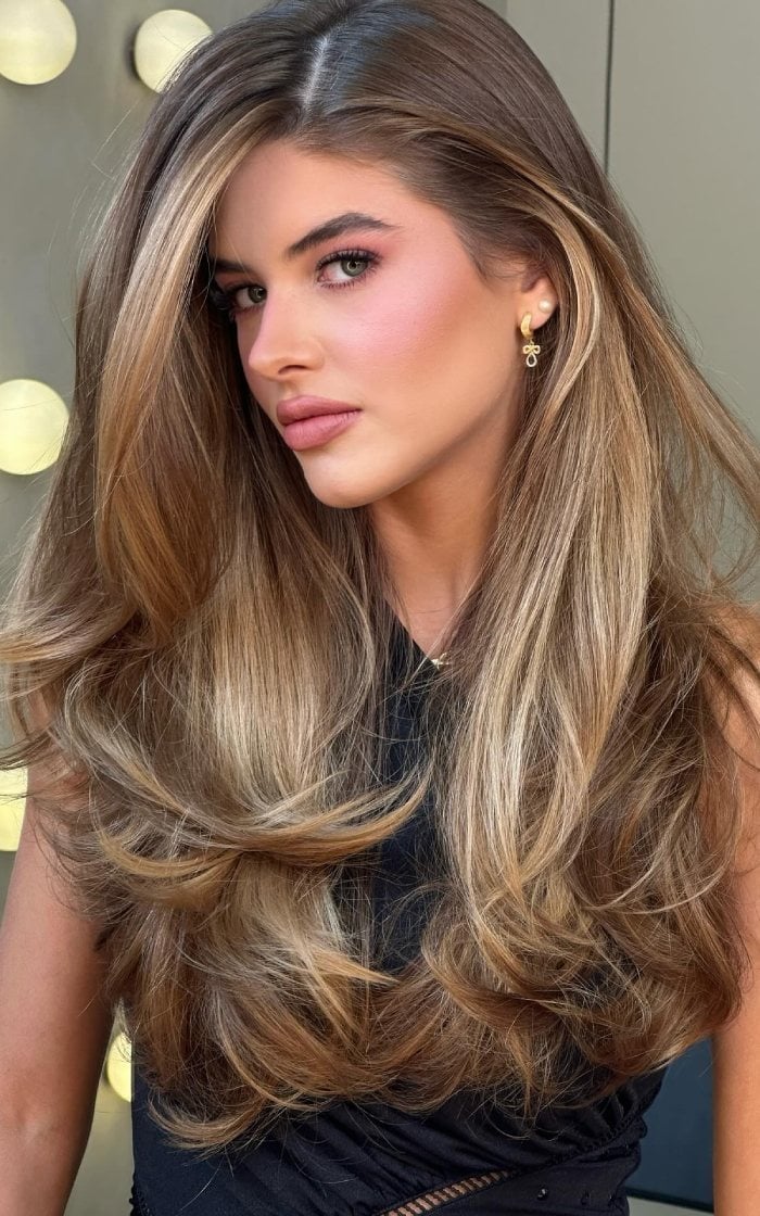 Mid-Back Hazelnut Cream Layers With Soft Curls Mid-Back Hazelnut Cream Layers With Soft Curls — Side Part Bangs