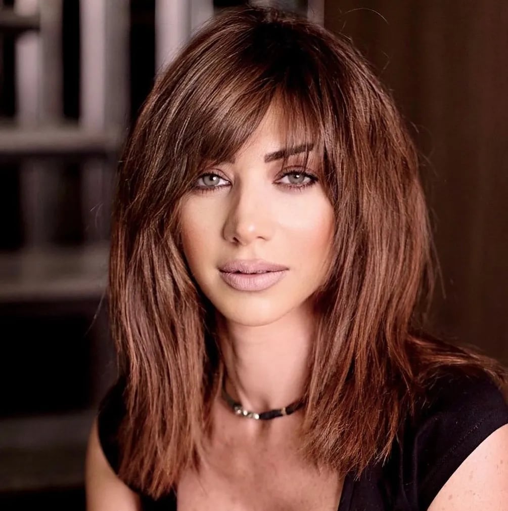 Shoulder Length Layers With Sweeping Bangs Shoulder Length Layers With Sweeping Bangs — Side Part Bangs