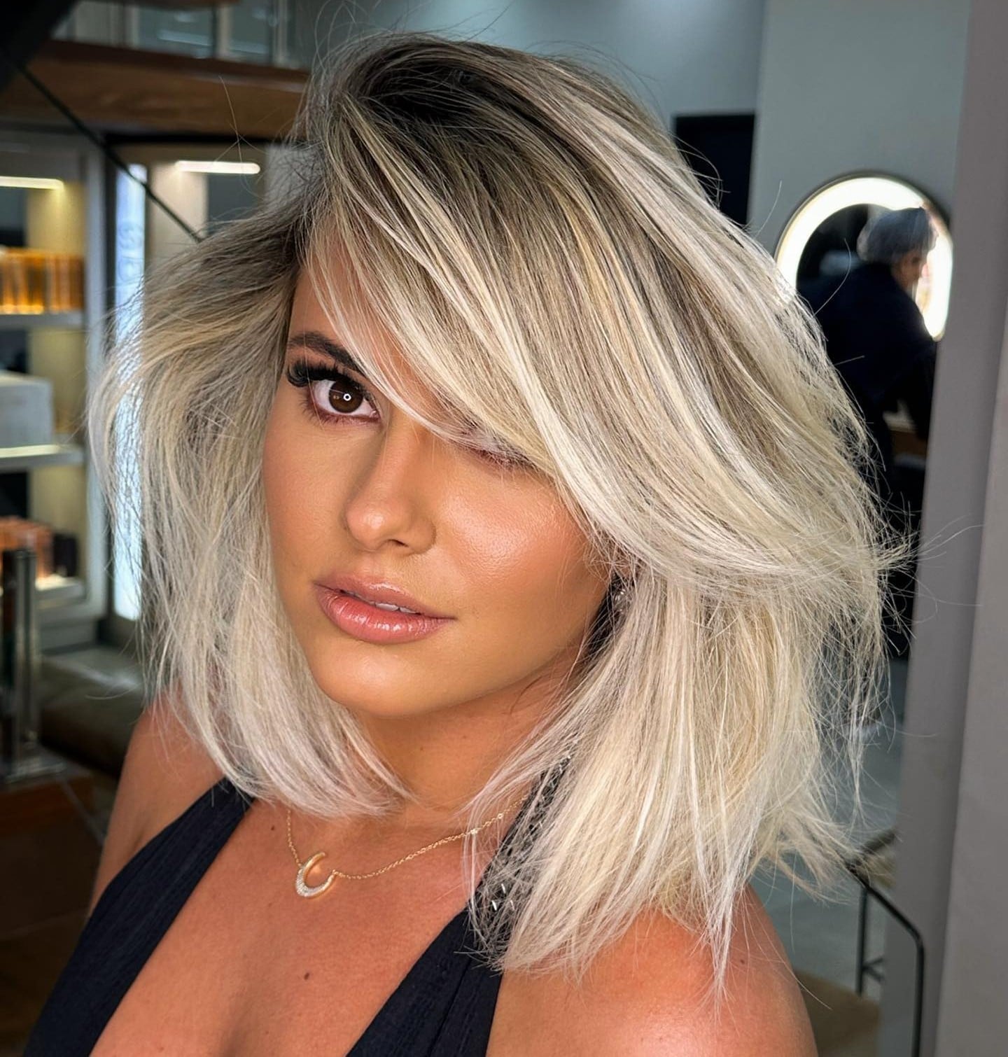 Collarbone Layered Bob With Ash Blonde Highlights Collarbone Layered Bob With Ash Blonde Highlights — Side Part Bangs